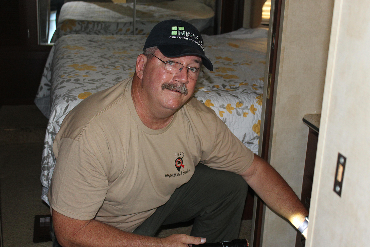 Rick Root, one of our RV Inspectors, inspecting the interior of a motorhome